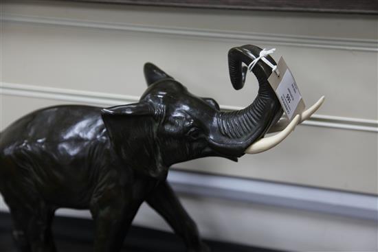 A French Art Deco patinated bronze model of a elephant, 23in.